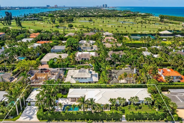 birds eye view of property featuring a residential view and a water view