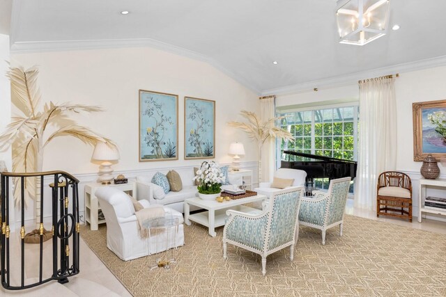 living room featuring ornamental molding and vaulted ceiling