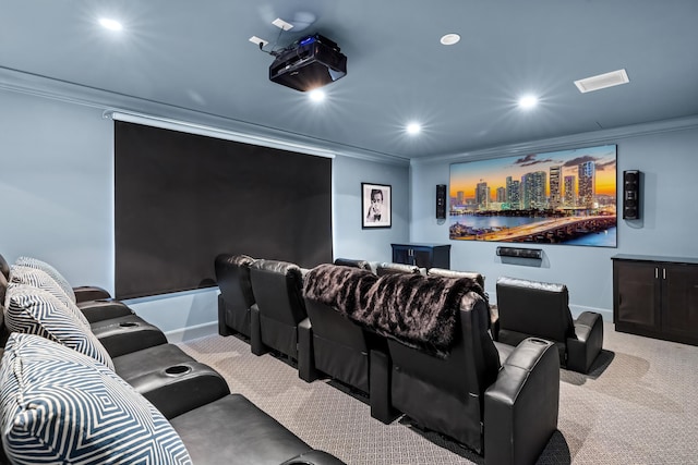 carpeted home theater with crown molding, recessed lighting, visible vents, and baseboards