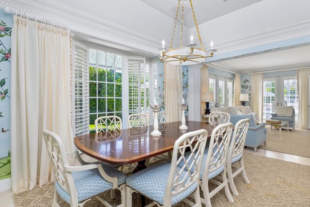 dining space with a notable chandelier