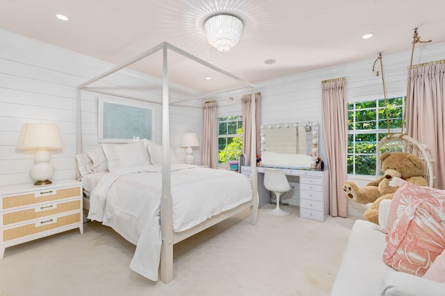 carpeted bedroom with recessed lighting