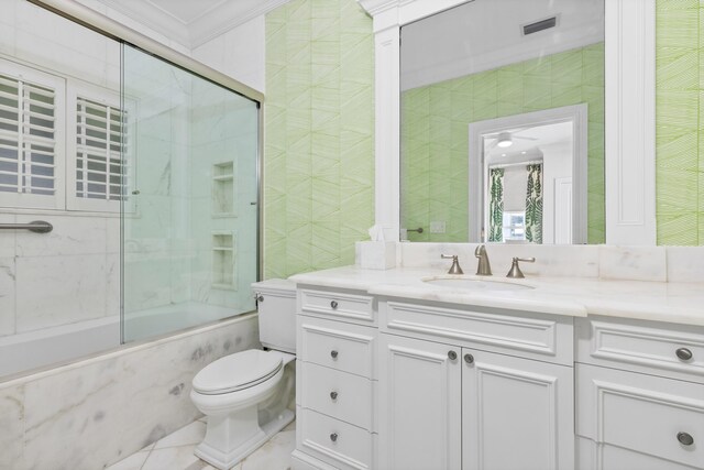 bathroom with ornamental molding, tile patterned floors, and double sink vanity