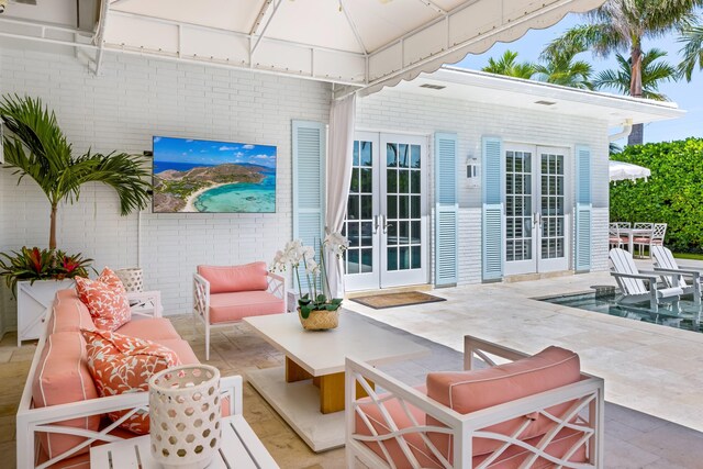 view of pool with ceiling fan and a patio area