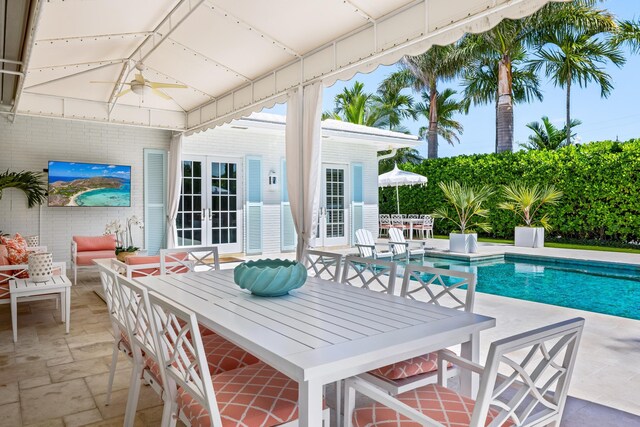 view of pool with a pergola, a patio, and french doors