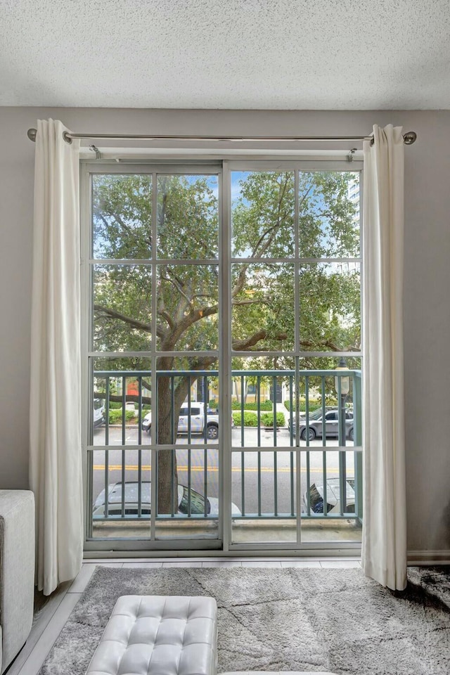 630 S Sapodilla Ave Unit 223, West Palm Beach, FL 33401 - doorway featuring a textured ceiling