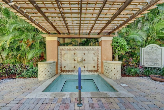 view of pool featuring a pergola