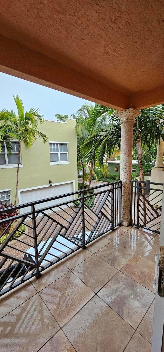 view of patio / terrace with a balcony