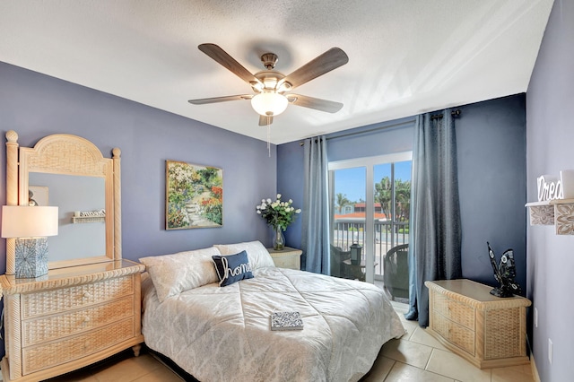 tiled bedroom with access to outside and ceiling fan