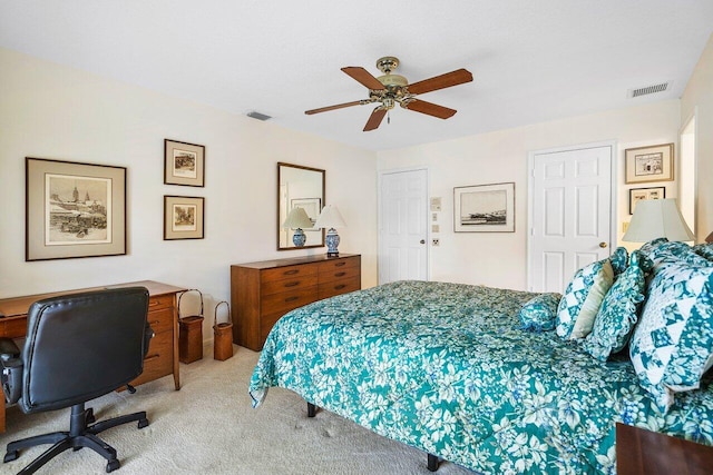 bedroom featuring ceiling fan and light colored carpet