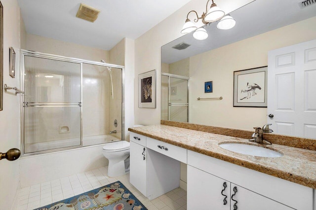 full bathroom with toilet, a notable chandelier, tile patterned flooring, combined bath / shower with glass door, and vanity