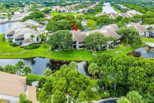 drone / aerial view with a water view