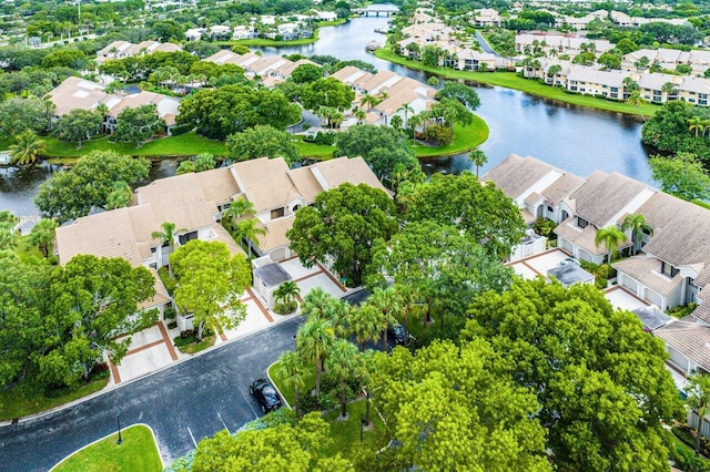 drone / aerial view with a water view