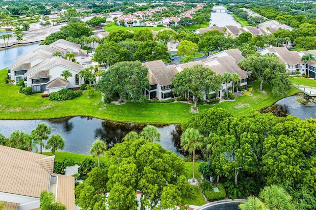 bird's eye view with a water view