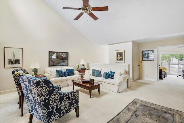 carpeted living room featuring a textured ceiling, ceiling fan, and high vaulted ceiling