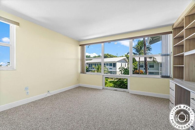 320 S Ocean Blvd Unit U-C, Delray Beach, FL 33483 - empty room featuring baseboards and light colored carpet