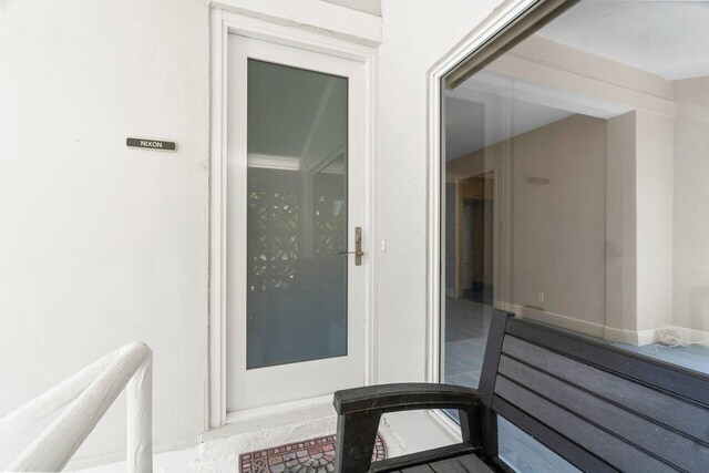 320 S Ocean Blvd Unit U-C, Delray Beach, FL 33483 - doorway to property featuring stucco siding