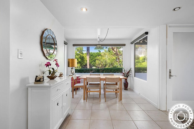 dining space with light tile patterned floors