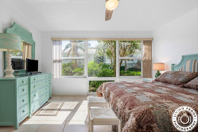 bedroom featuring ceiling fan and light tile patterned flooring