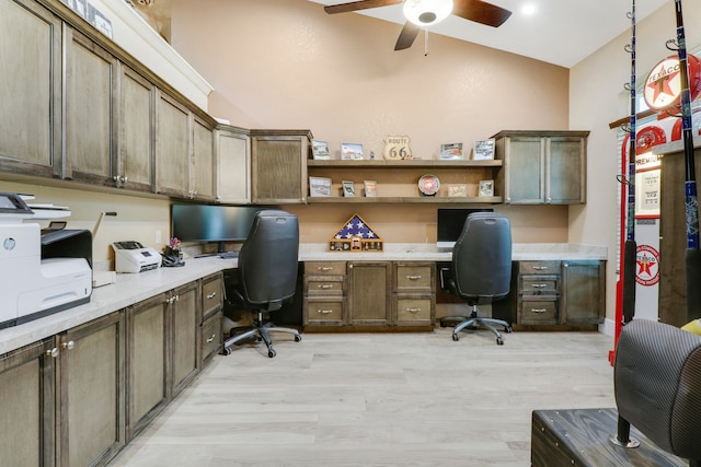 office area featuring ceiling fan, light hardwood / wood-style flooring, and built in desk