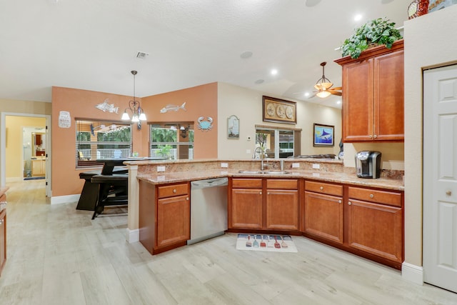 kitchen with light hardwood / wood-style flooring, kitchen peninsula, decorative light fixtures, ceiling fan with notable chandelier, and dishwasher