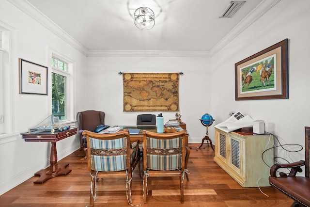 office space with hardwood / wood-style flooring and ornamental molding