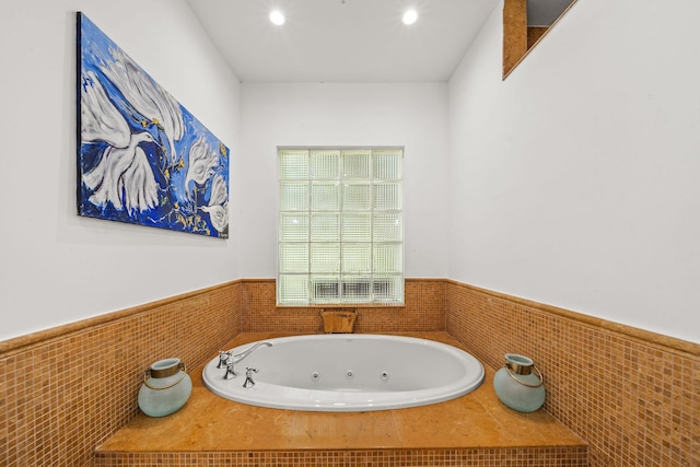 bathroom featuring a tub