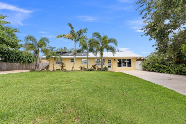 single story home with a front yard