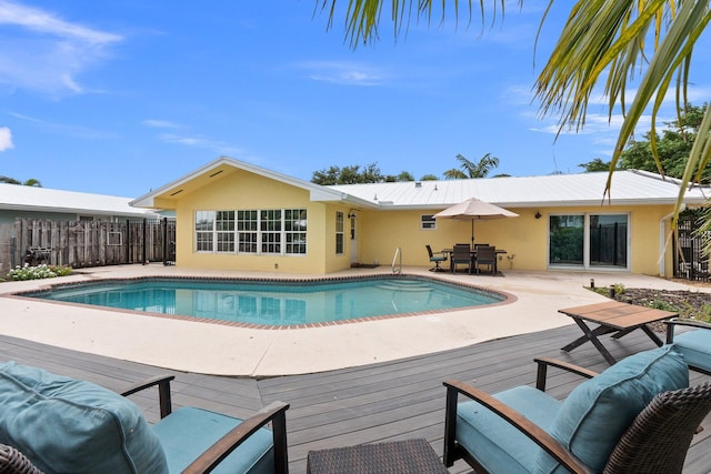 view of pool with a deck