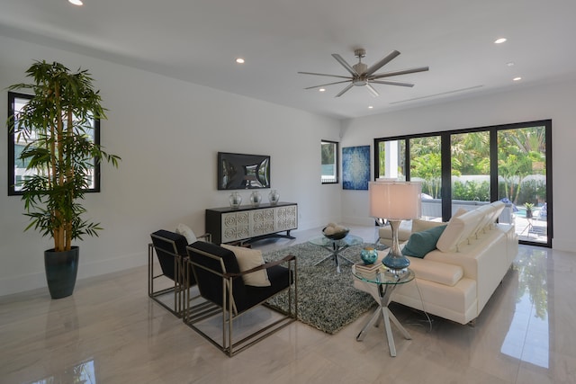 living room featuring light tile patterned flooring and ceiling fan