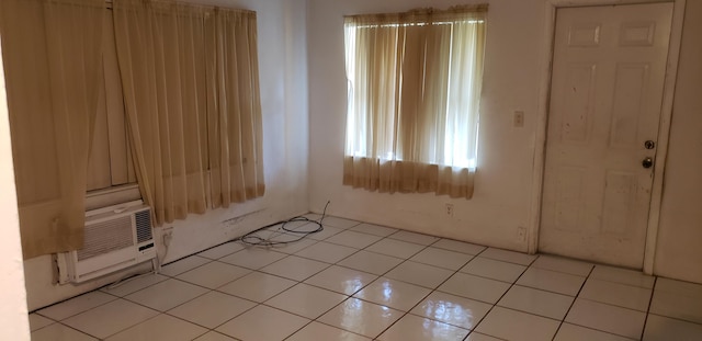 interior space with light tile patterned floors