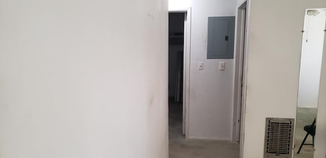 corridor with visible vents and electric panel
