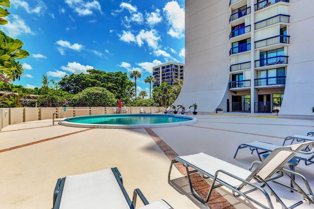 view of pool with a patio area