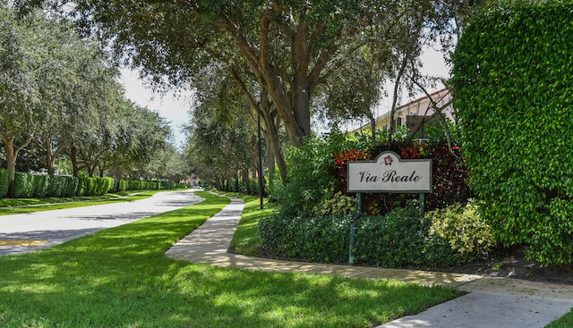 view of community featuring a lawn