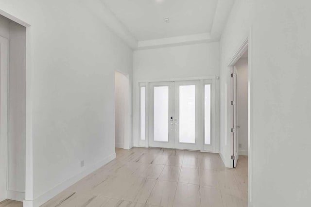 entryway featuring french doors