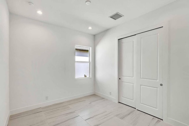 unfurnished bedroom featuring a closet