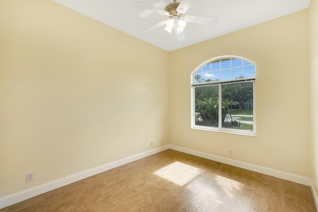 unfurnished room with ceiling fan and light hardwood / wood-style flooring