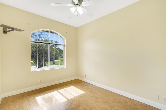 spare room featuring ceiling fan and light hardwood / wood-style floors