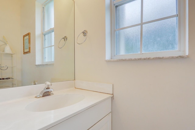 bathroom featuring vanity and plenty of natural light