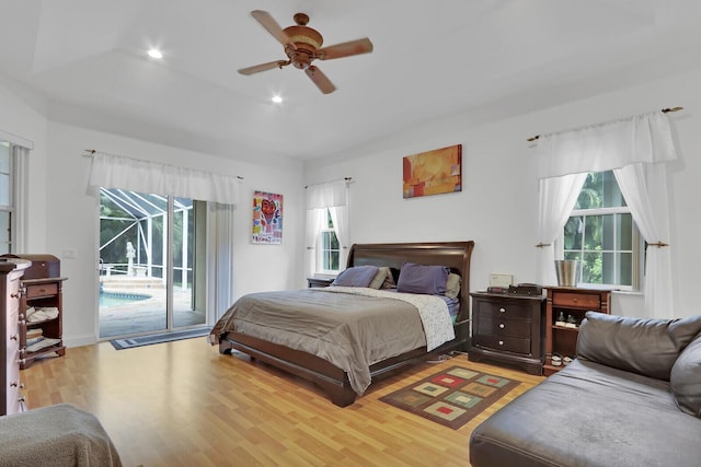 bedroom with light hardwood / wood-style floors, access to exterior, and ceiling fan