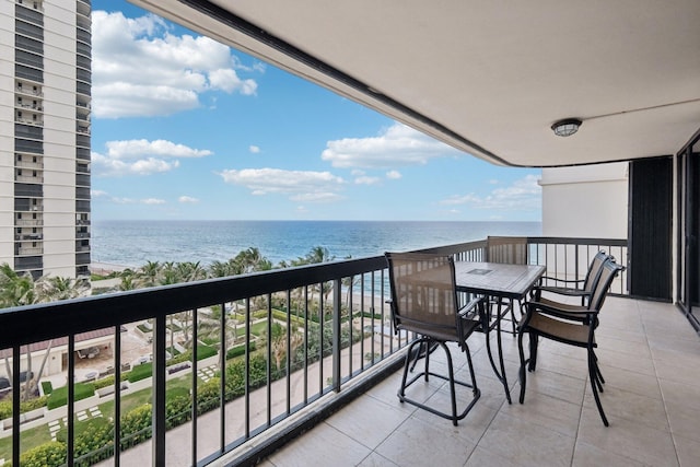 balcony featuring a water view