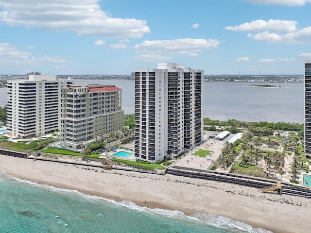 aerial view featuring a water view and a beach view