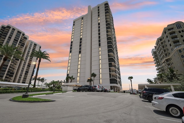 view of outdoor building at dusk