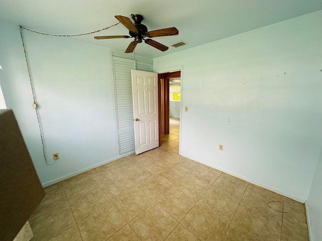 unfurnished bedroom with ceiling fan