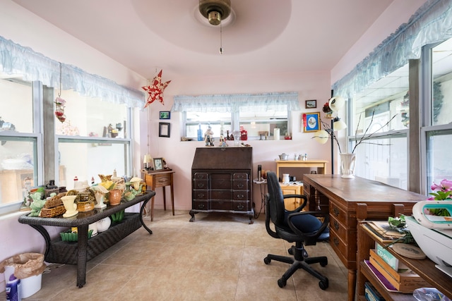 home office featuring ceiling fan and light tile patterned flooring