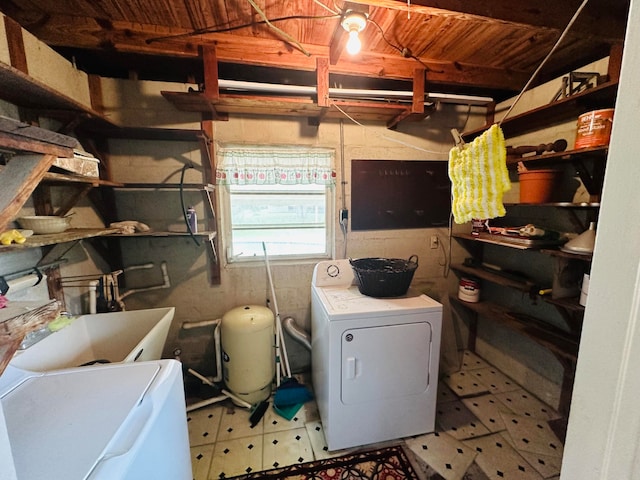 washroom featuring sink and separate washer and dryer