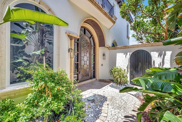 doorway to property featuring a balcony