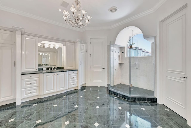 bathroom with tile patterned flooring, a notable chandelier, crown molding, a shower with shower door, and vanity