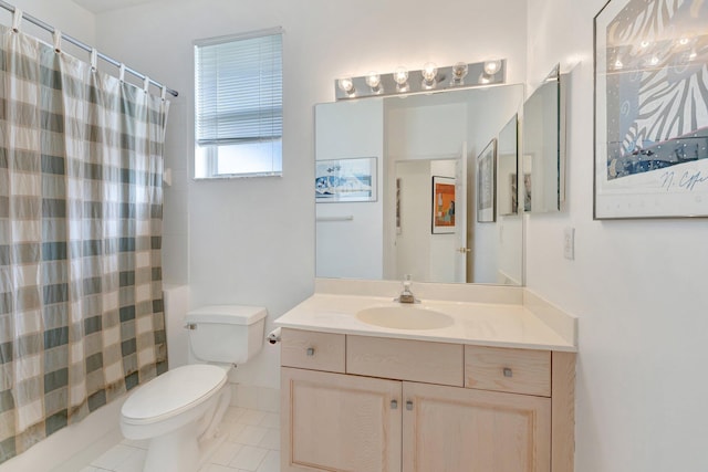 full bathroom featuring tile patterned floors, vanity, shower / bath combo, and toilet