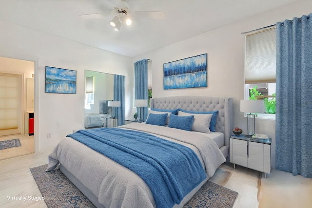 bedroom featuring ceiling fan and light hardwood / wood-style floors