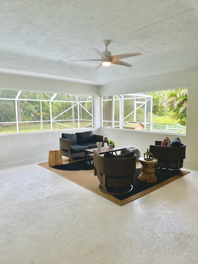 living room with ceiling fan